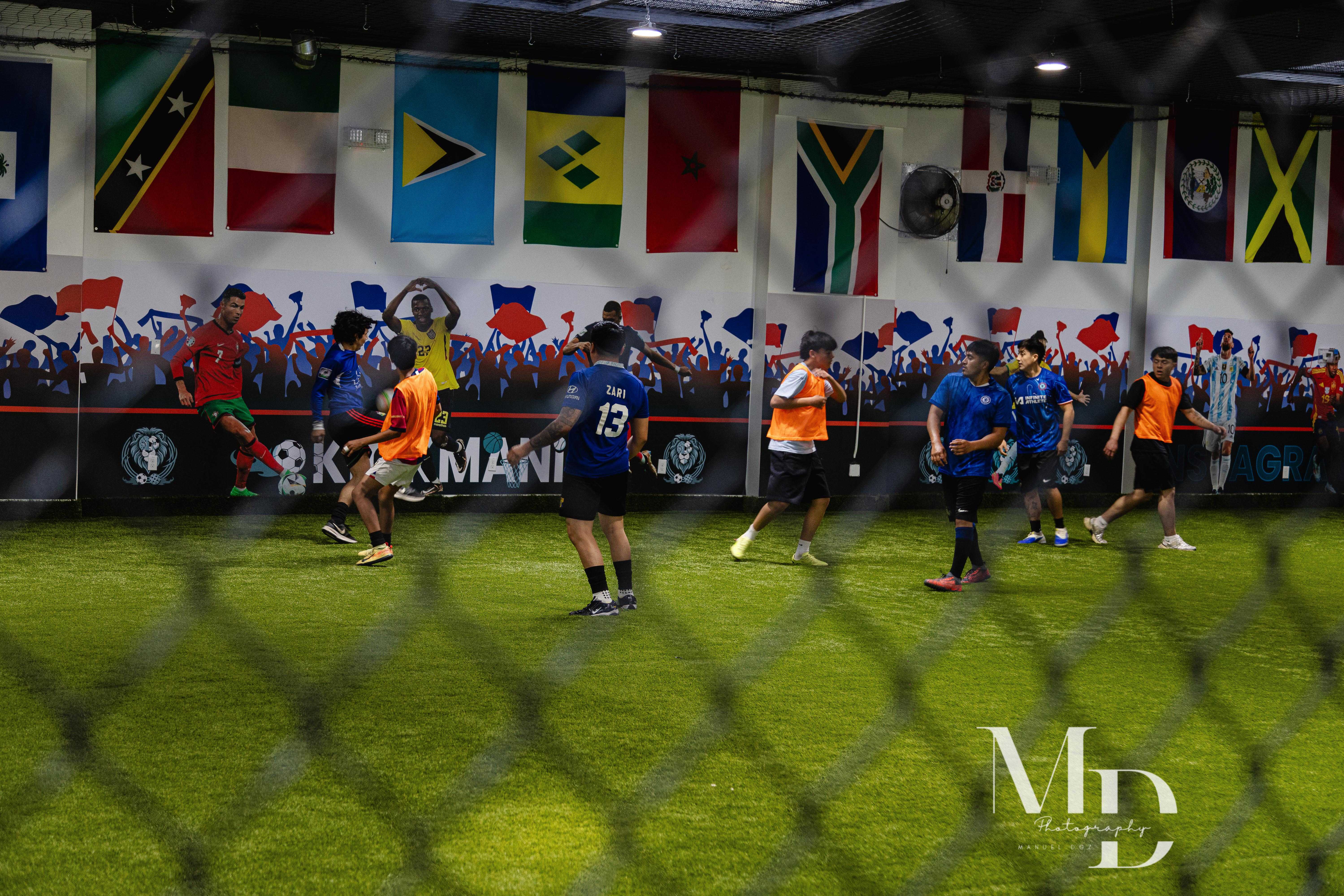 Pickup futsal game with players in colored bibs