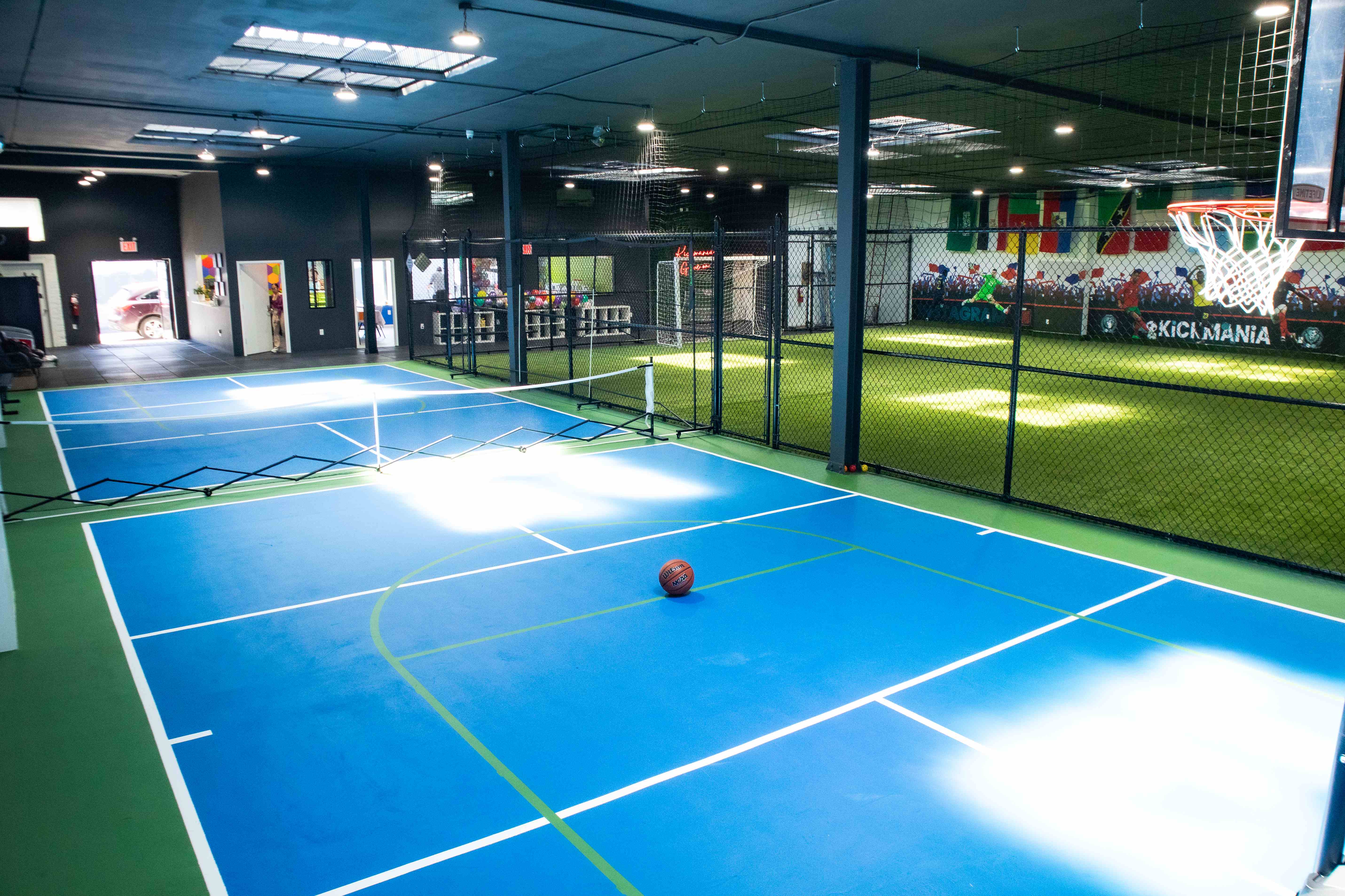 Full facility view showing pickleball courts and the futsal field